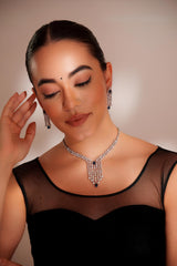 Elegant and sleek diamond pendant set with sapphire stone and earrings