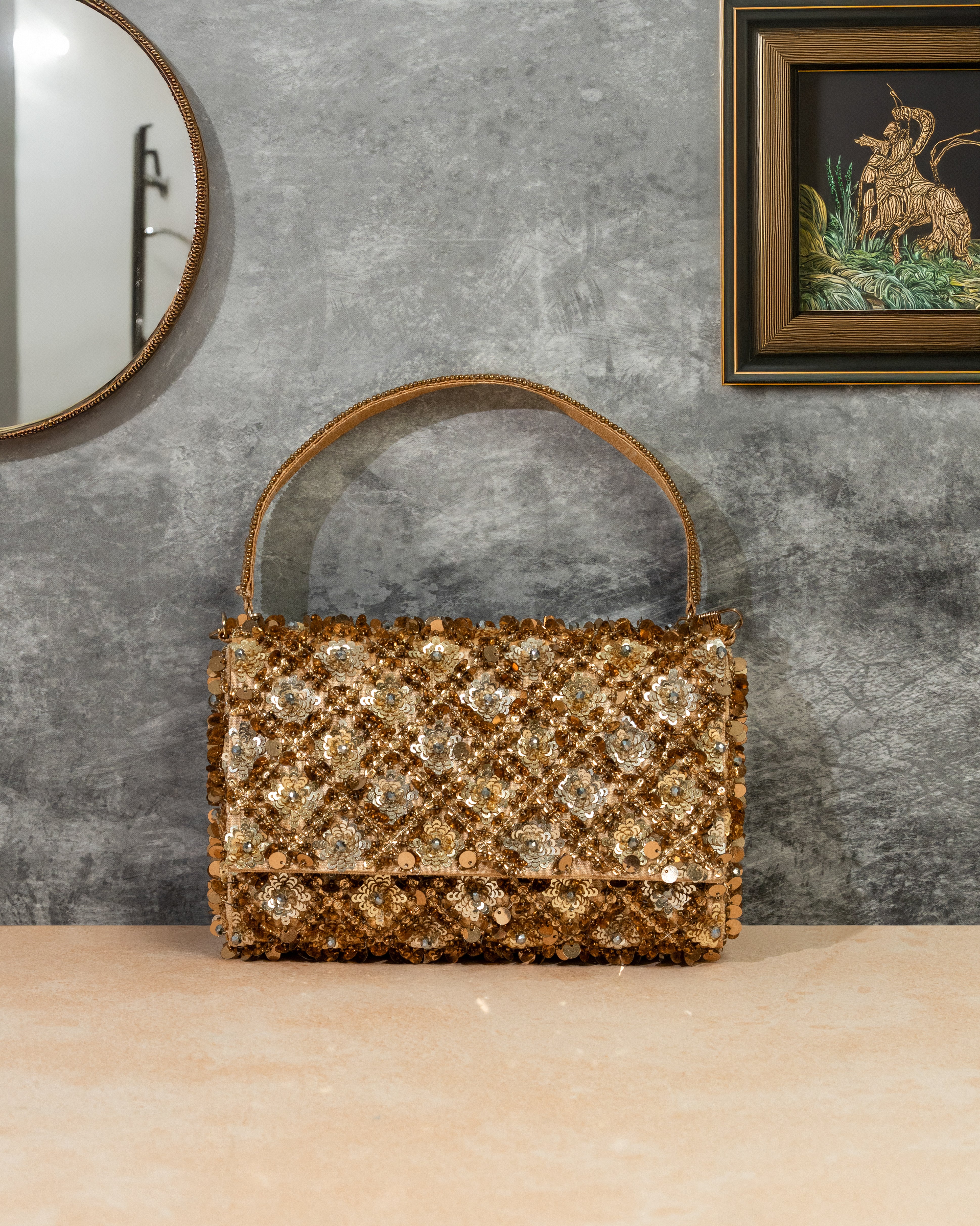Golden tessle clutch