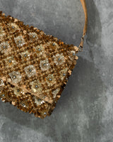 Golden tessle clutch