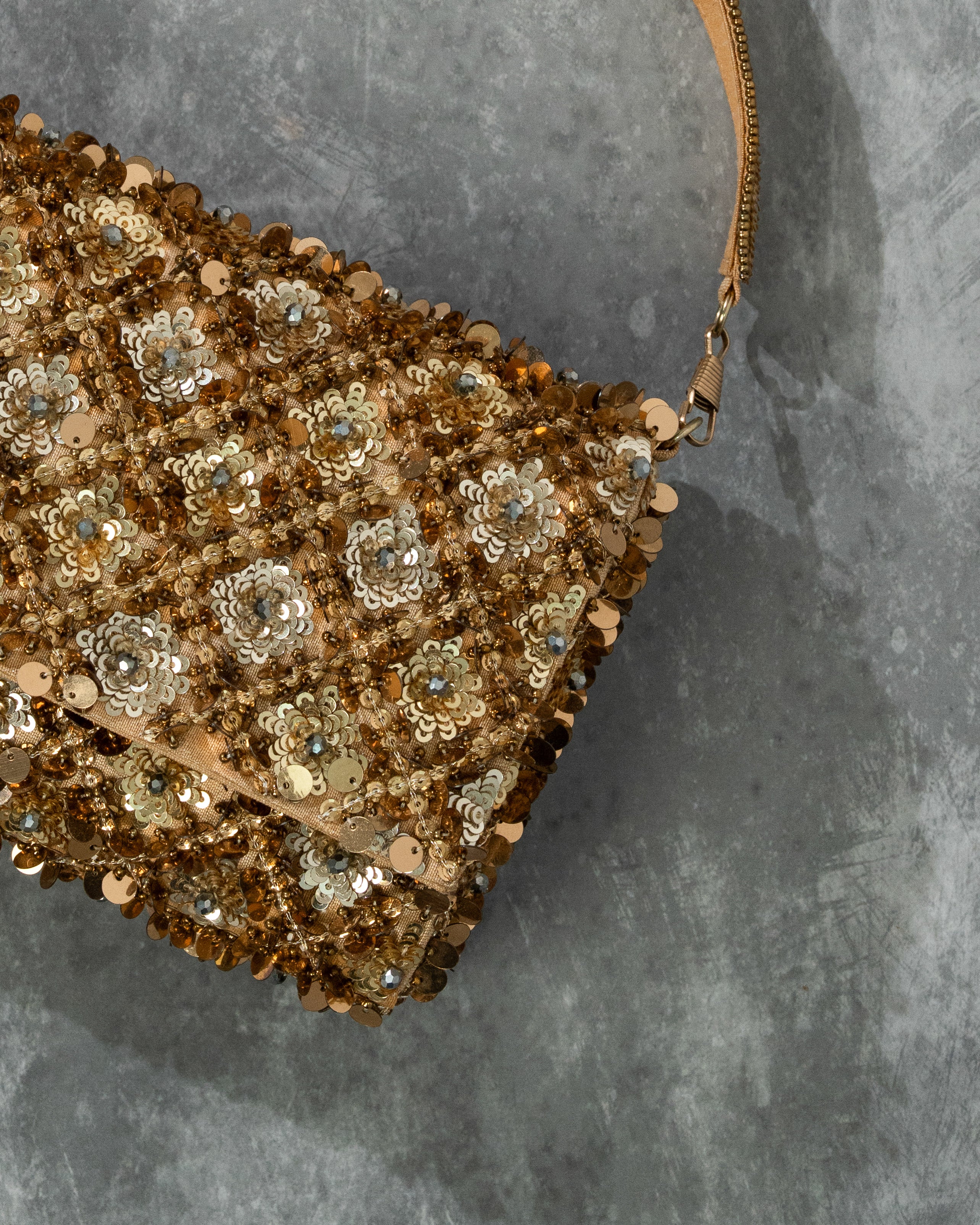 Golden tessle clutch