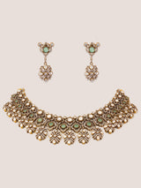 Dramatic and classy two tone kundan polki stone necklace set with matching earrings