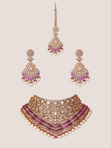 Bold and dramatic polki necklace set with matching earrings and maangtika