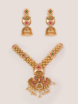 Traditional yet classic kundan temple necklace with elegant pair of earrings