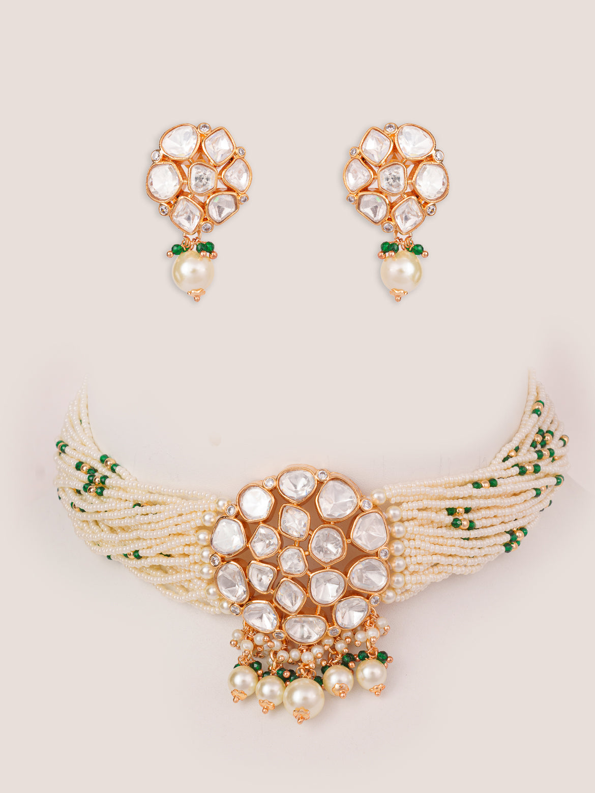 Classy kundan choker set with elegant pair of earrings.