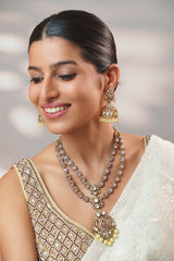 Bold and dramatic long polki necklace set with matching earrings