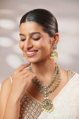 Bold and dramatic long polki necklace set with matching earrings