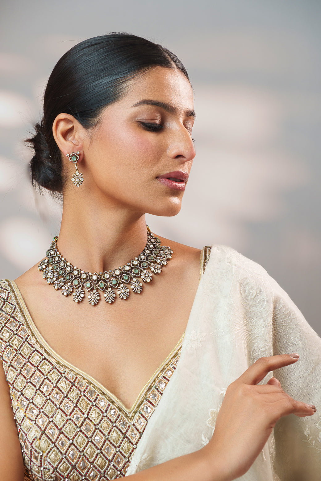 Dramatic and classy two tone kundan polki stone necklace set with matching earrings