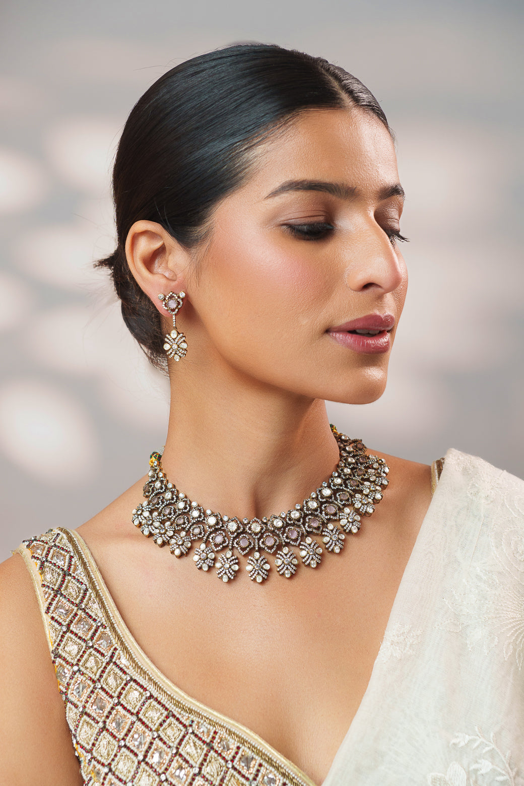 Dramatic and classy two tone kundan polki stone necklace set with matching earrings