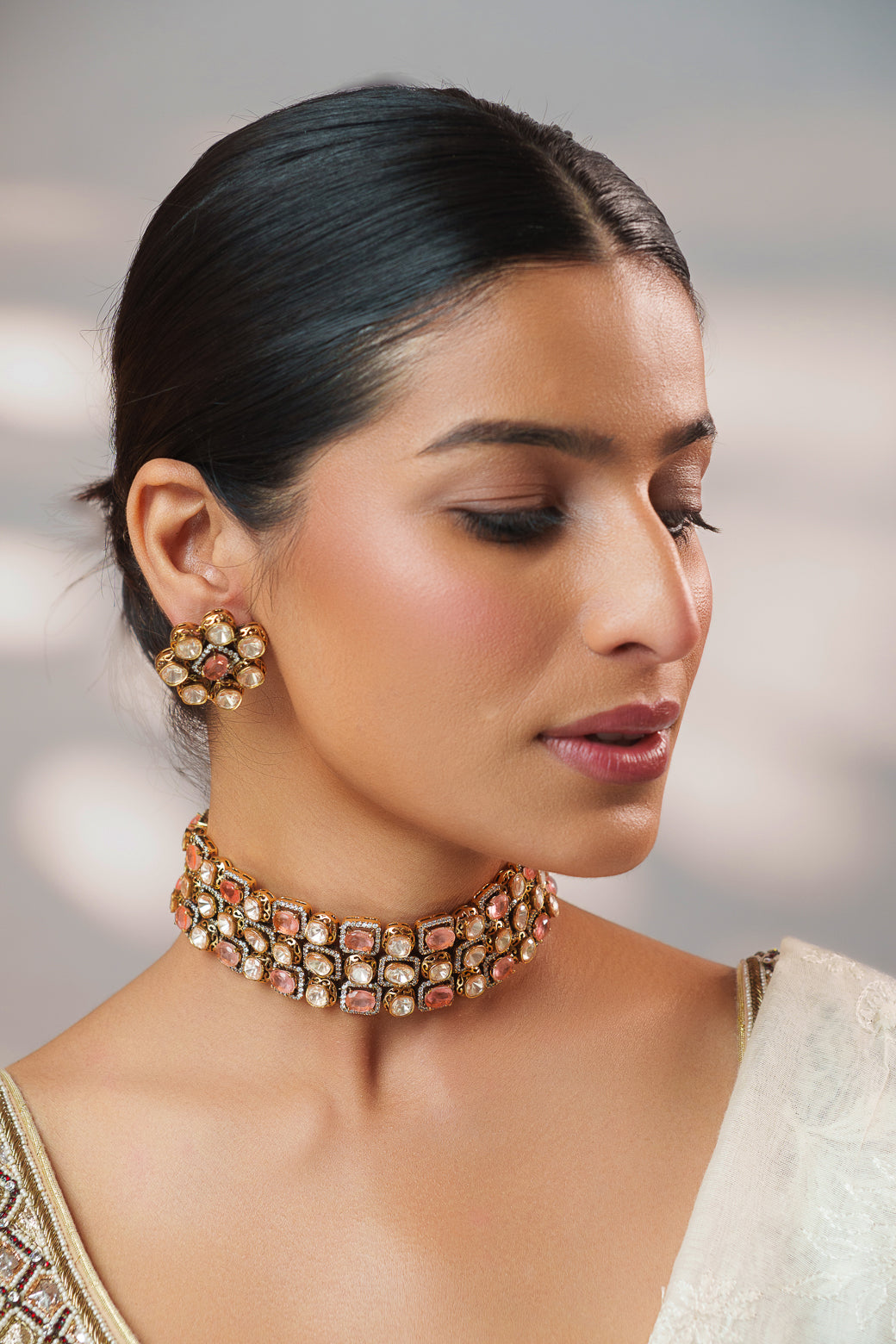 Dramatic and classy two tone kundan choker with matching earrings