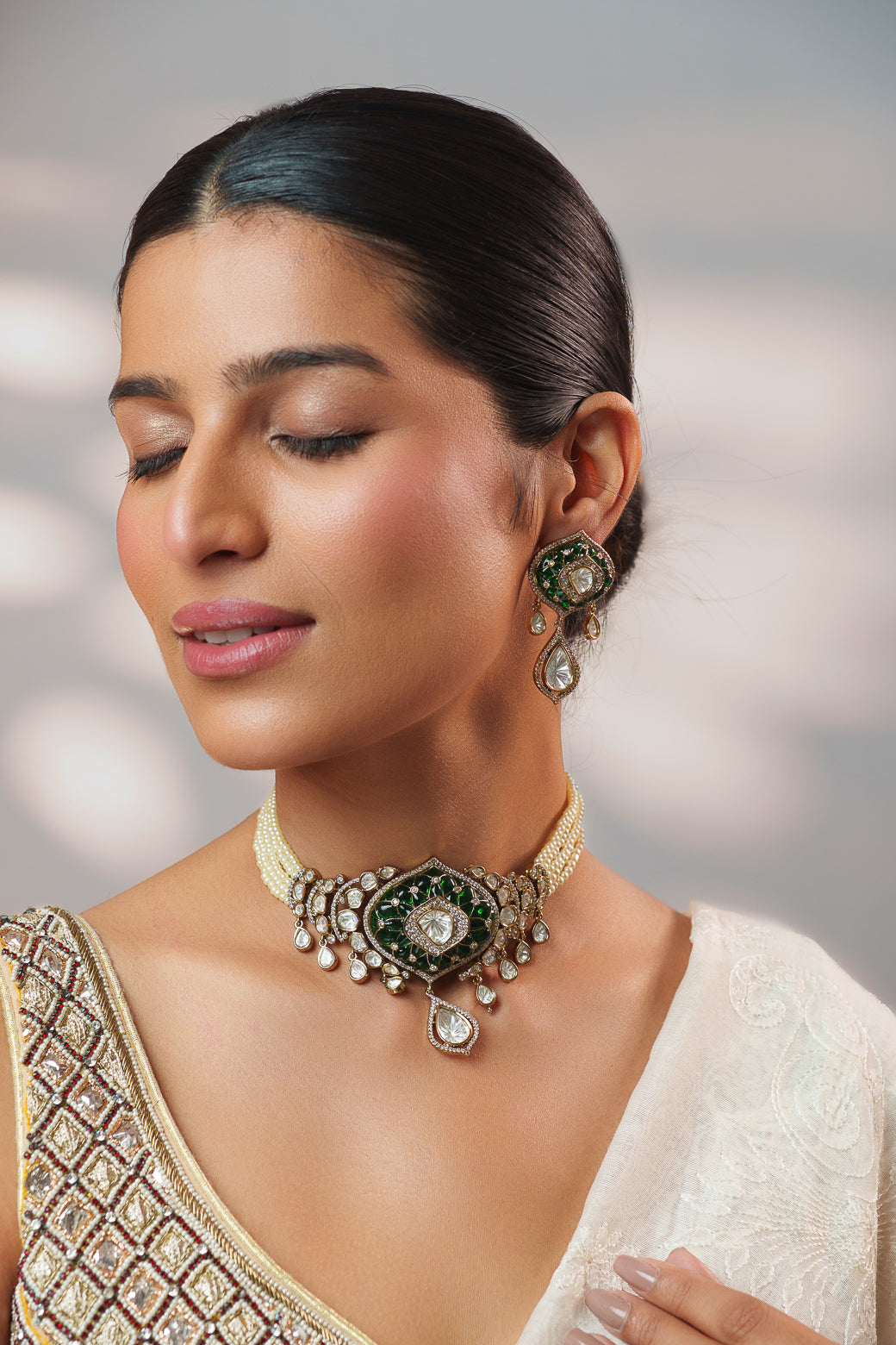 Dramatic and classy two tone polki choker with matching earrings