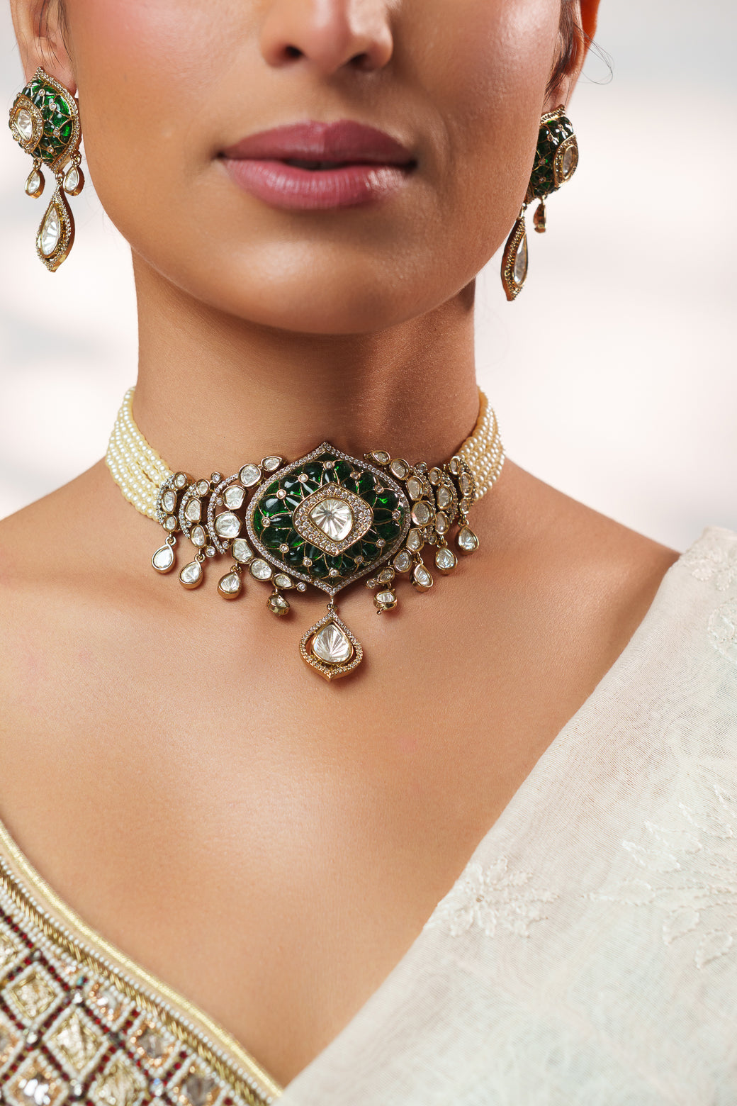 Dramatic and classy two tone polki choker with matching earrings