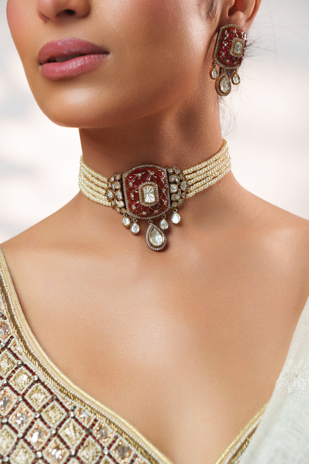 Dramatic and classy two tone polki choker with matching earrings