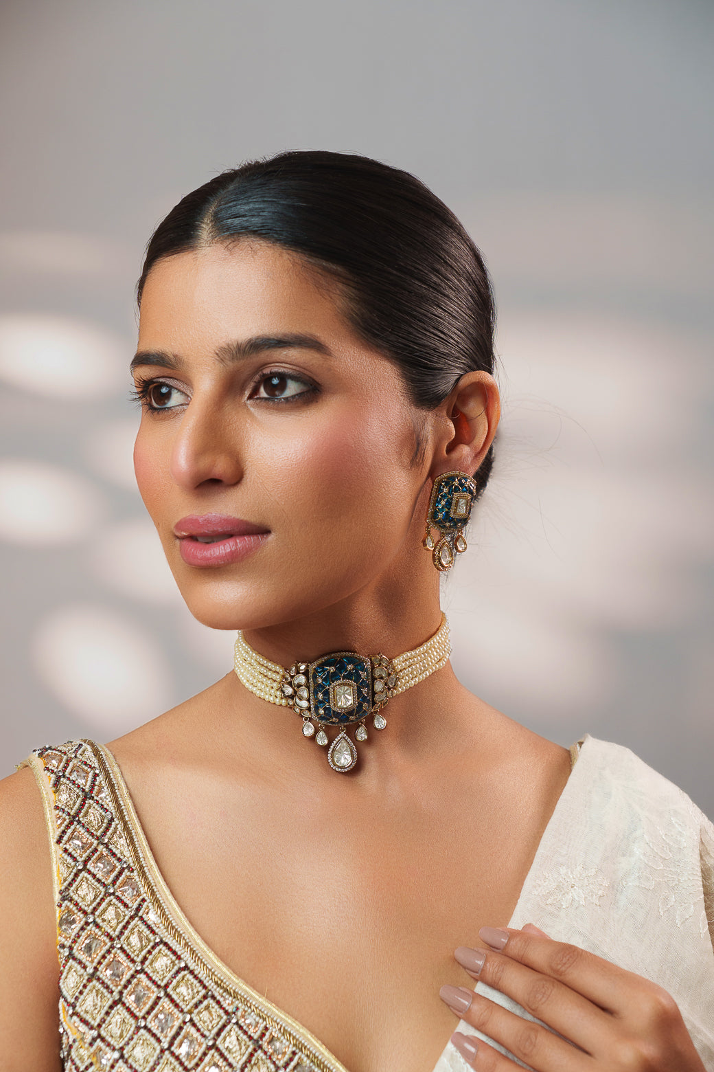 Dramatic and classy two tone polki choker with matching earrings