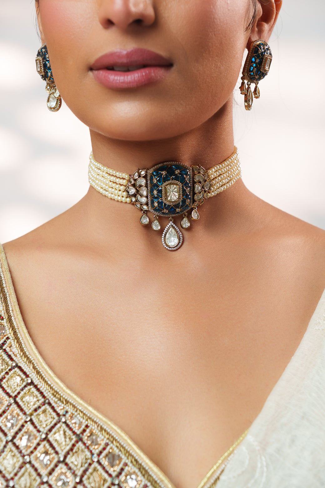 Dramatic and classy two tone polki choker with matching earrings