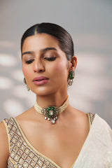 Dramatic and classy two tone polki choker with matching earrings