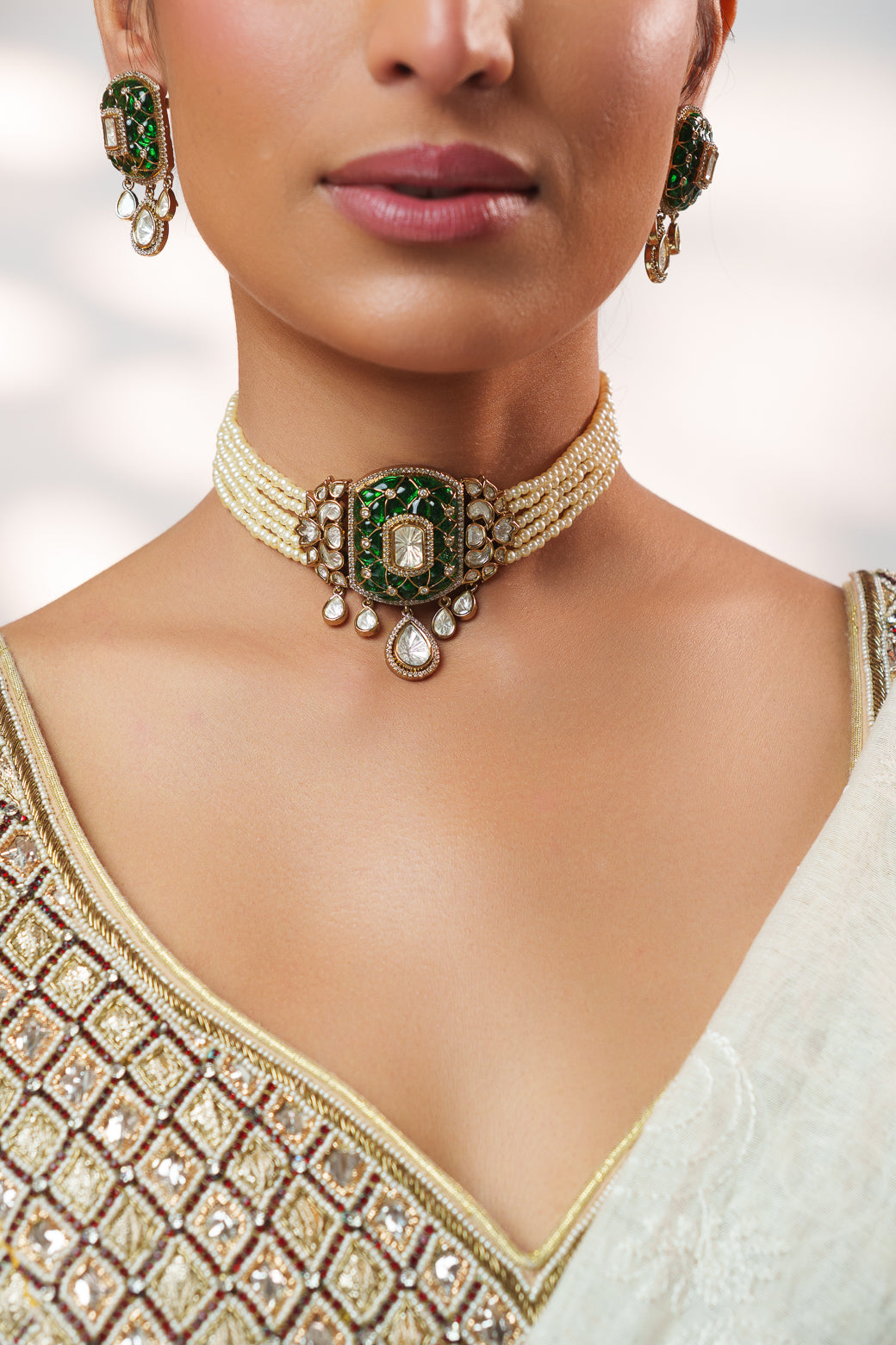 Dramatic and classy two tone polki choker with matching earrings