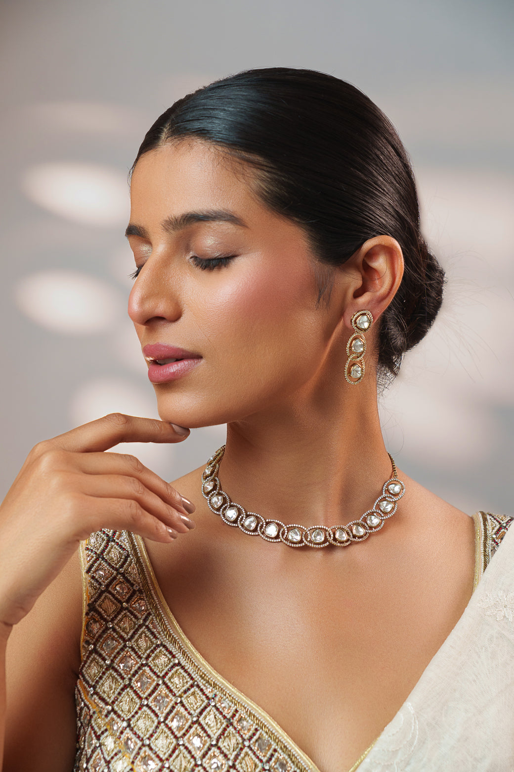 Dramatic and classy two tone kundan polki stone necklace set with matching earrings