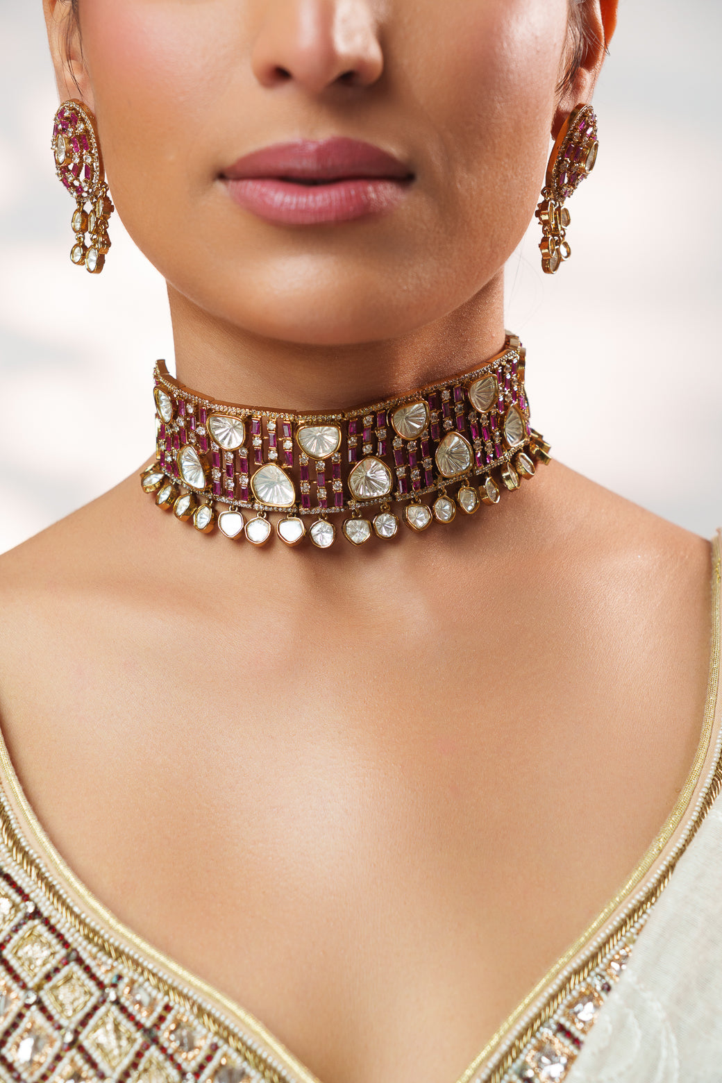 Dramatic and classy two tone polki choker with matching earrings