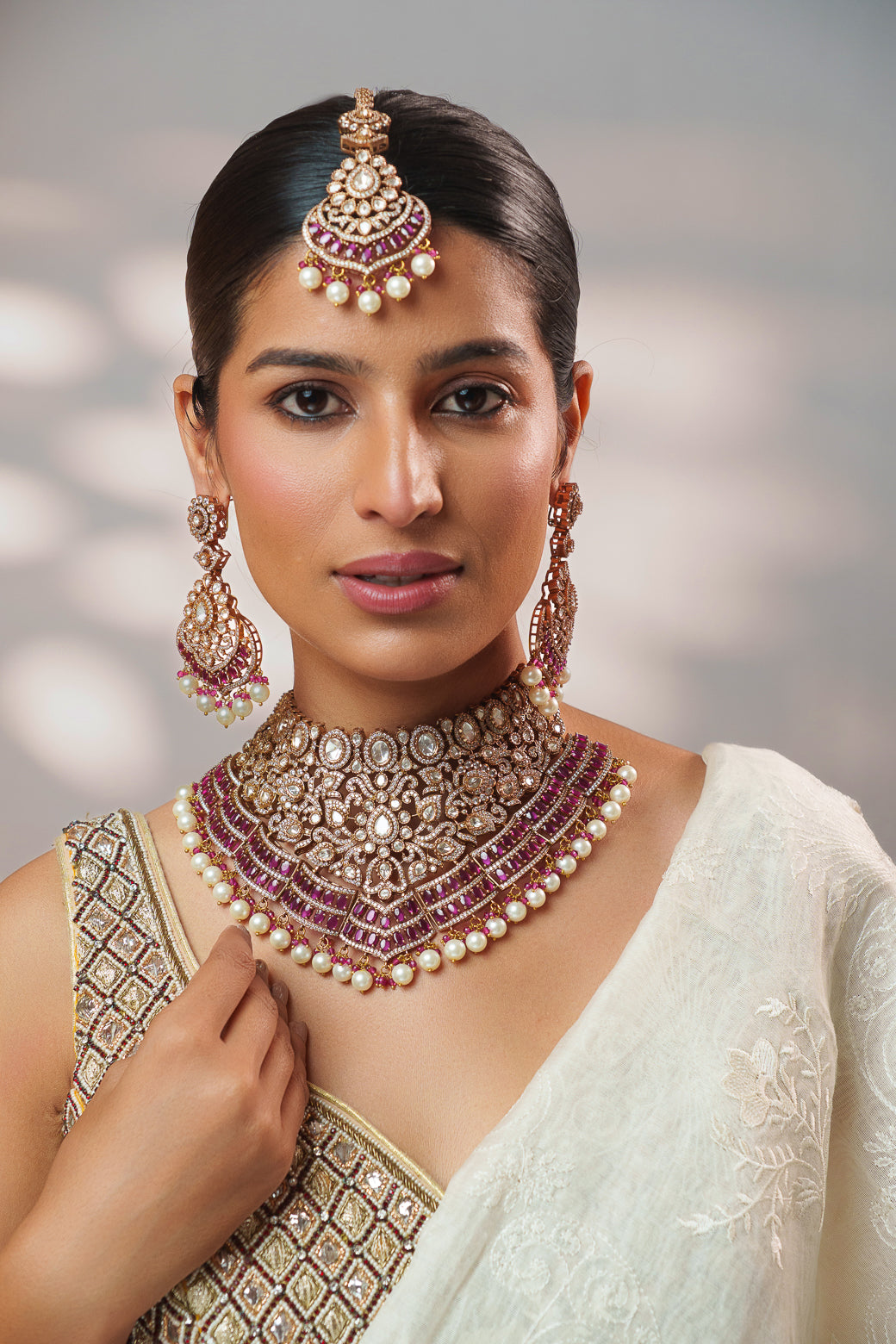 Bold and dramatic polki necklace set with matching earrings and maangtika