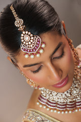 Bold and dramatic polki necklace set with matching earrings and maangtika