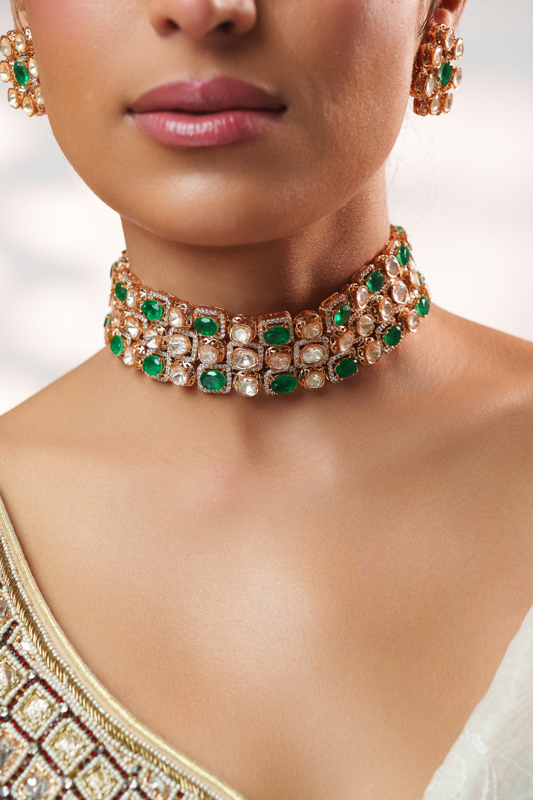 Dramatic and classy two tone kundan choker with matching earrings