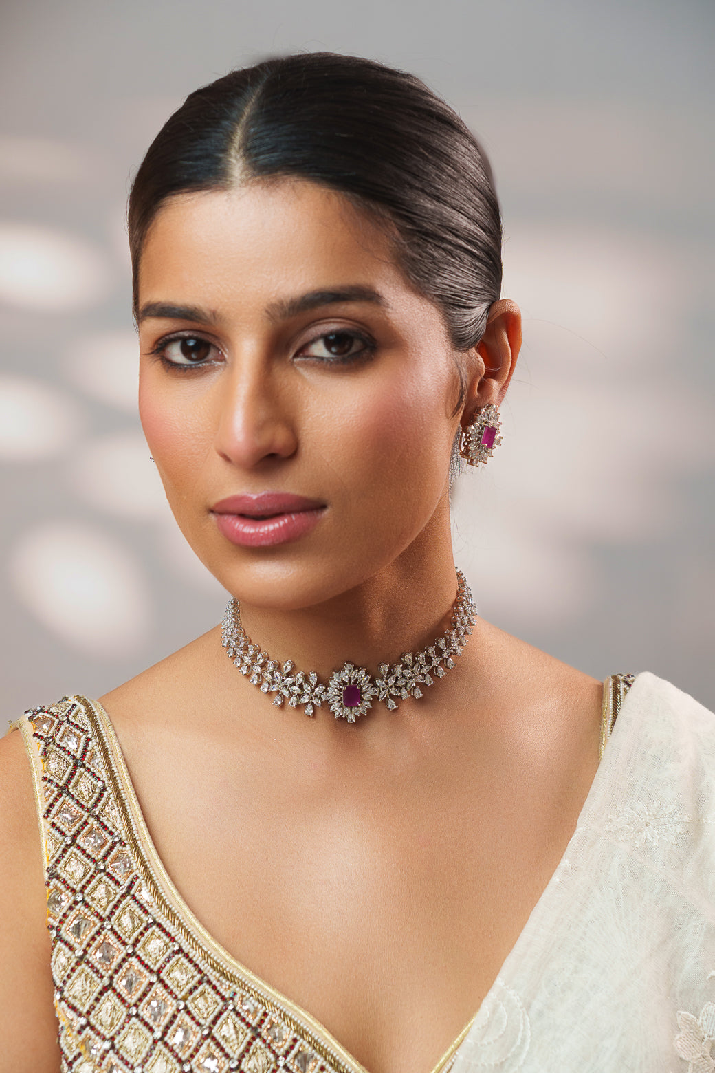Elegant diamond choker with peach stone and earrings