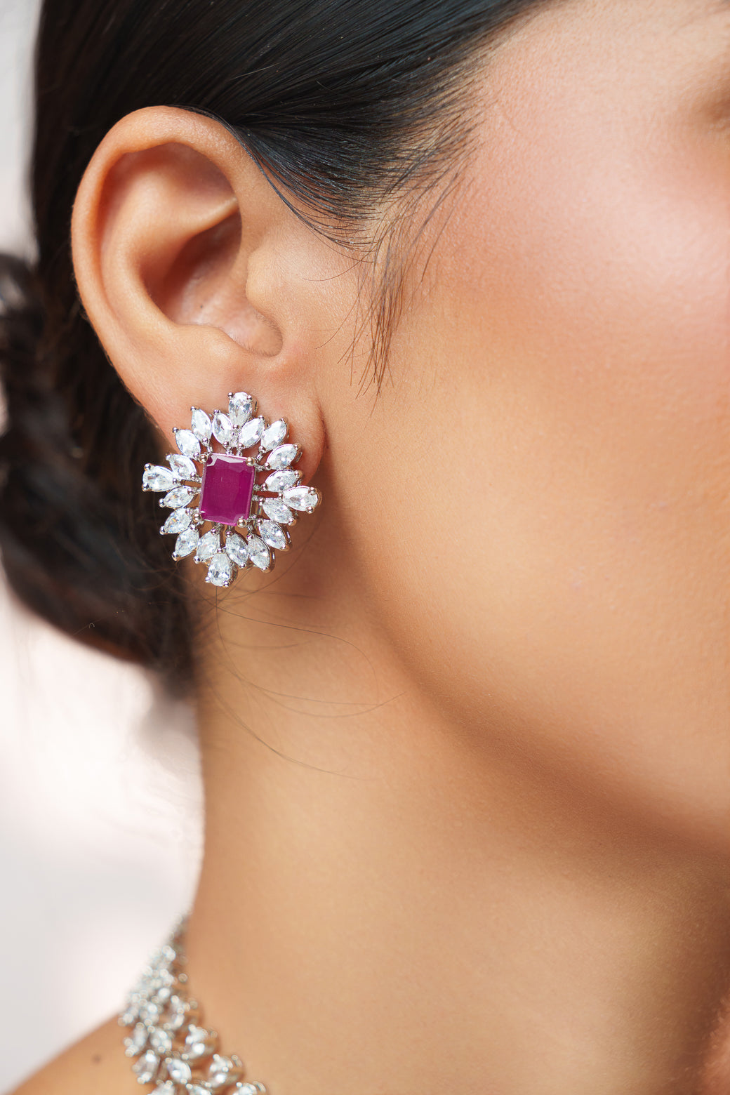 Elegant diamond choker with peach stone and earrings