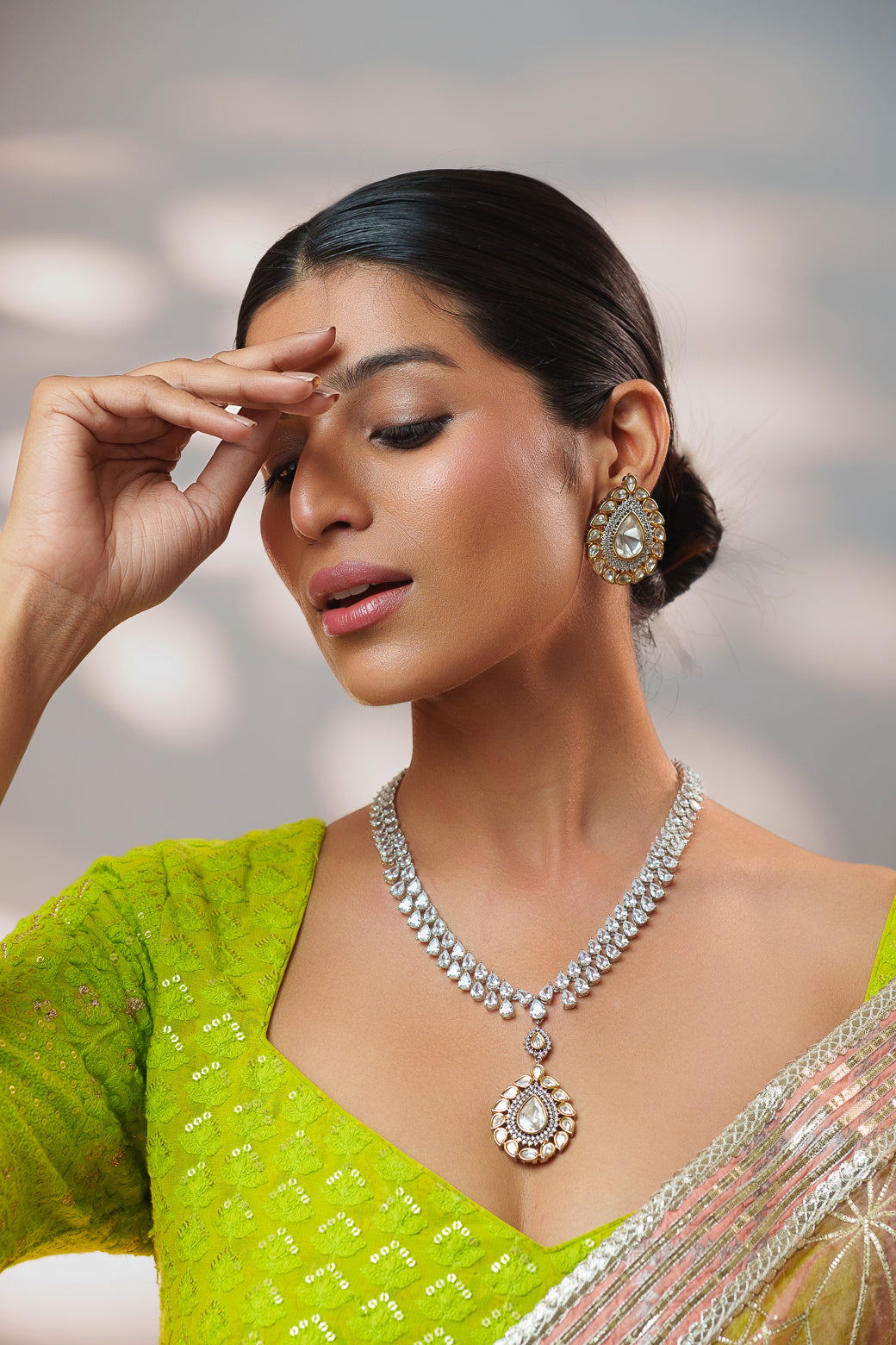 Extraordinary fusion of kundan and diamond necklace set with earrings