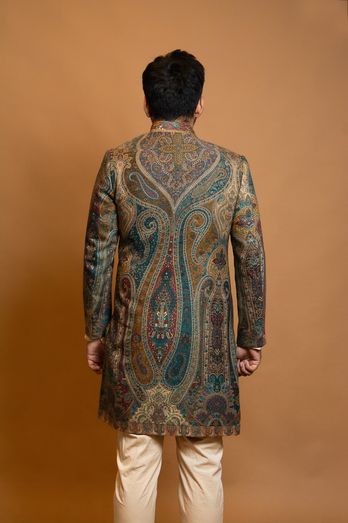 JAMAWAR PATTERNED SHORT ACHKAN PAIRED WITH A BEIGE COTTON SILK KURTA AND PANT
