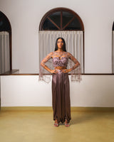 Embroidered cape with tassels, embroidered cropped top, draped pants