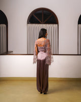 Embroidered cape with tassels, embroidered cropped top, draped pants