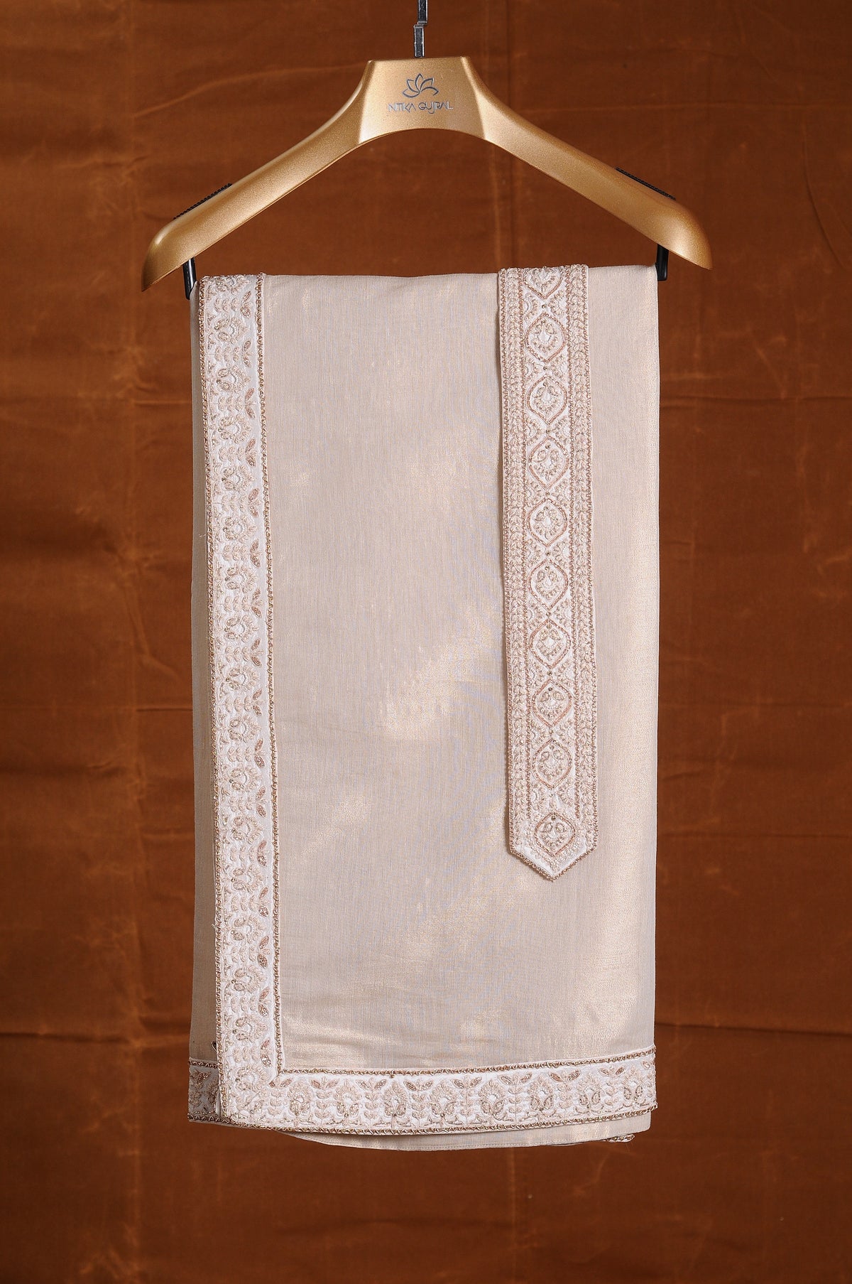 IVORY TAFETTA SHERWANI WITH MONGA SILK KURTA AND CHURIDAR