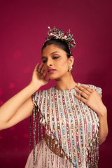 Peachy Pink ajrakh stripwork jacket paired up with Peachy pink bralette and drape dhoti skirt