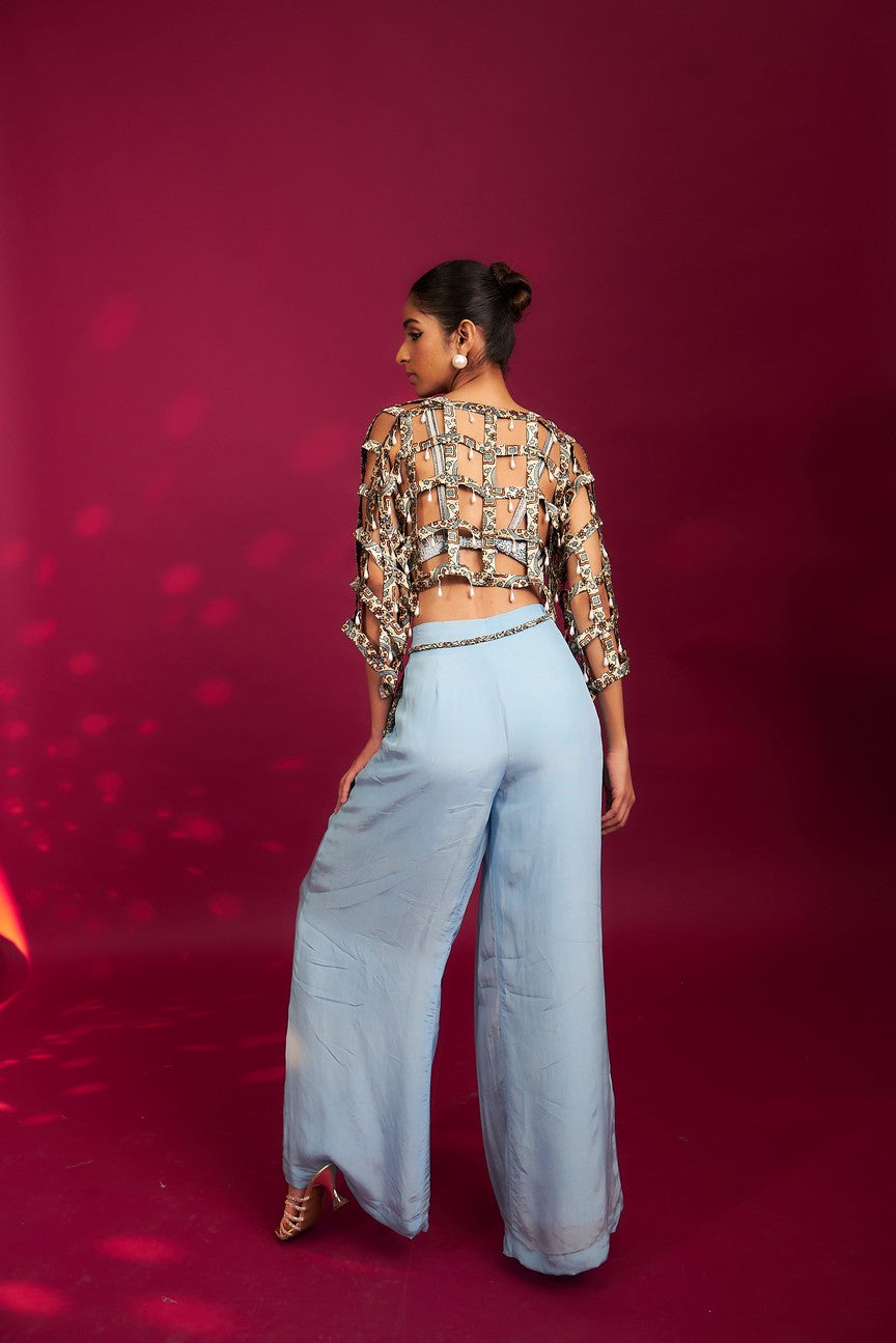 Powder blue ajrakh stripped jacket with embellished brallete and inverted pleated pants