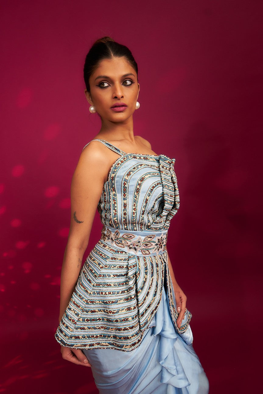 Powder blue ajrakh embroidered assymetric peplum top with Drape dhoti skirt