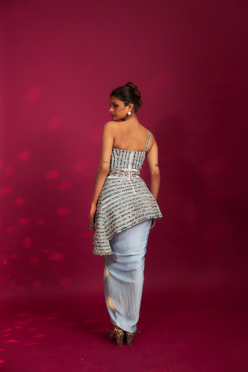 Powder blue ajrakh embroidered assymetric peplum top with Drape dhoti skirt