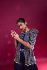 Deep blue side cowl jumpsuit with Ajrakh embellished jacket with patchwork waistbelt