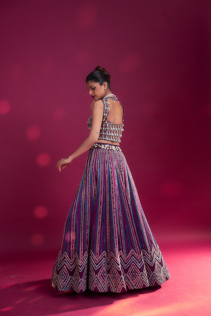 Dark purple ajrakh embellished blouse and jacket fir lehenga