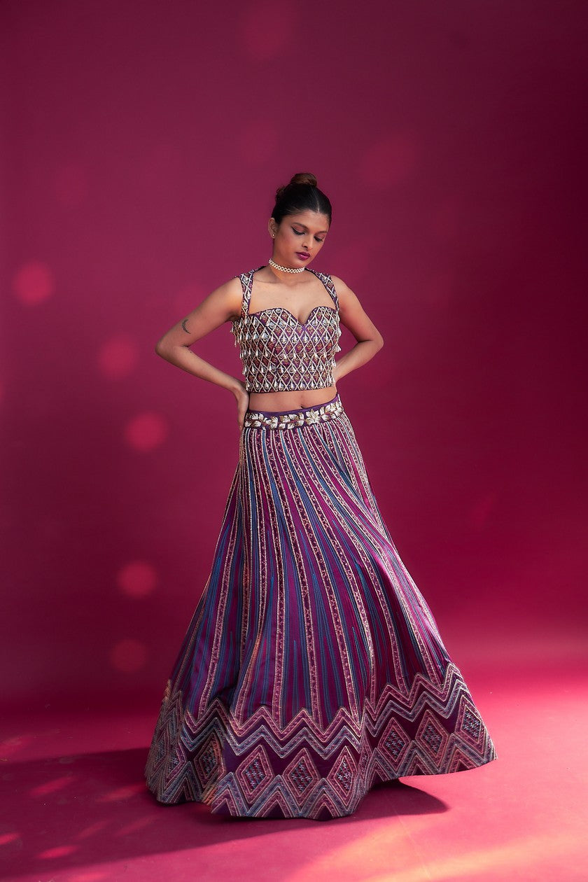 Dark purple ajrakh embellished blouse and jacket fir lehenga