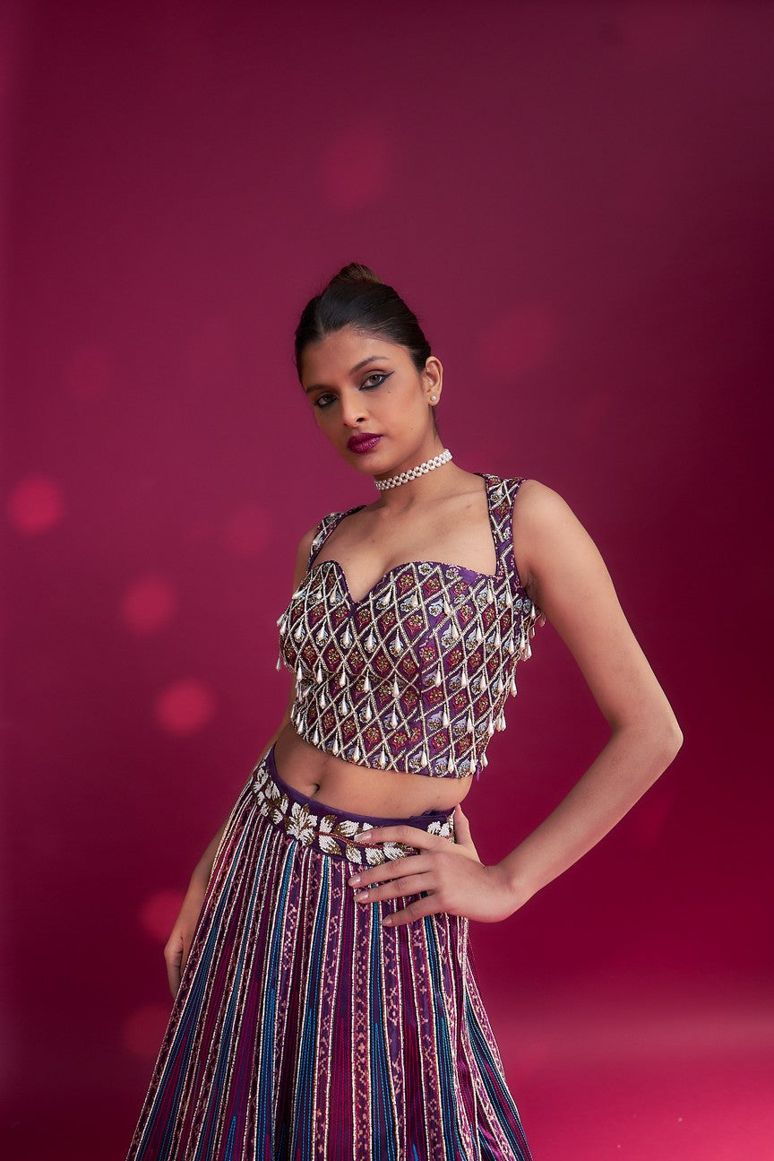 Dark purple ajrakh embellished blouse and jacket fir lehenga
