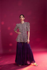Purple fully embellished ajrakh peplum top with tiered sharara set