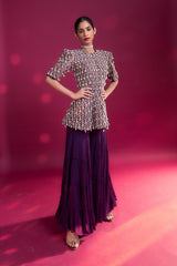 Purple fully embellished ajrakh peplum top with tiered sharara set