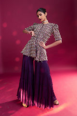 Purple fully embellished ajrakh peplum top with tiered sharara set