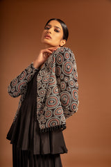 Black fully embroidered jacket with peplum top and pleated pants