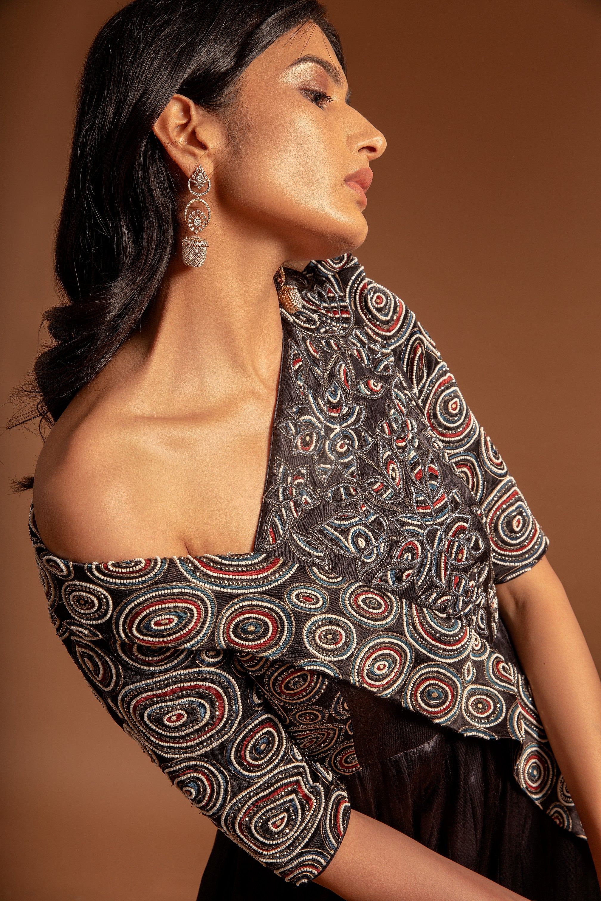 Black fully embroidered one off shoulder ajrakh anarkali