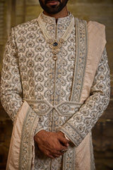 IVORY TAFFETA SILK SHERWANI BEIGE FRENCH KNOTS AND ZARDOZI WORK