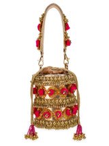 gold pompom handbag