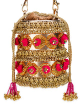gold pompom handbag