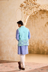 TURQ 3-D EMBROIDERED FLORAL WORK BUNDI WITH BLUE KURTA CHURIDAR