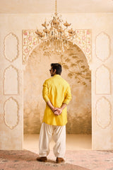 EMBROIDERED MUSTARD PINTUCKED KURTA WITH SALWAR
